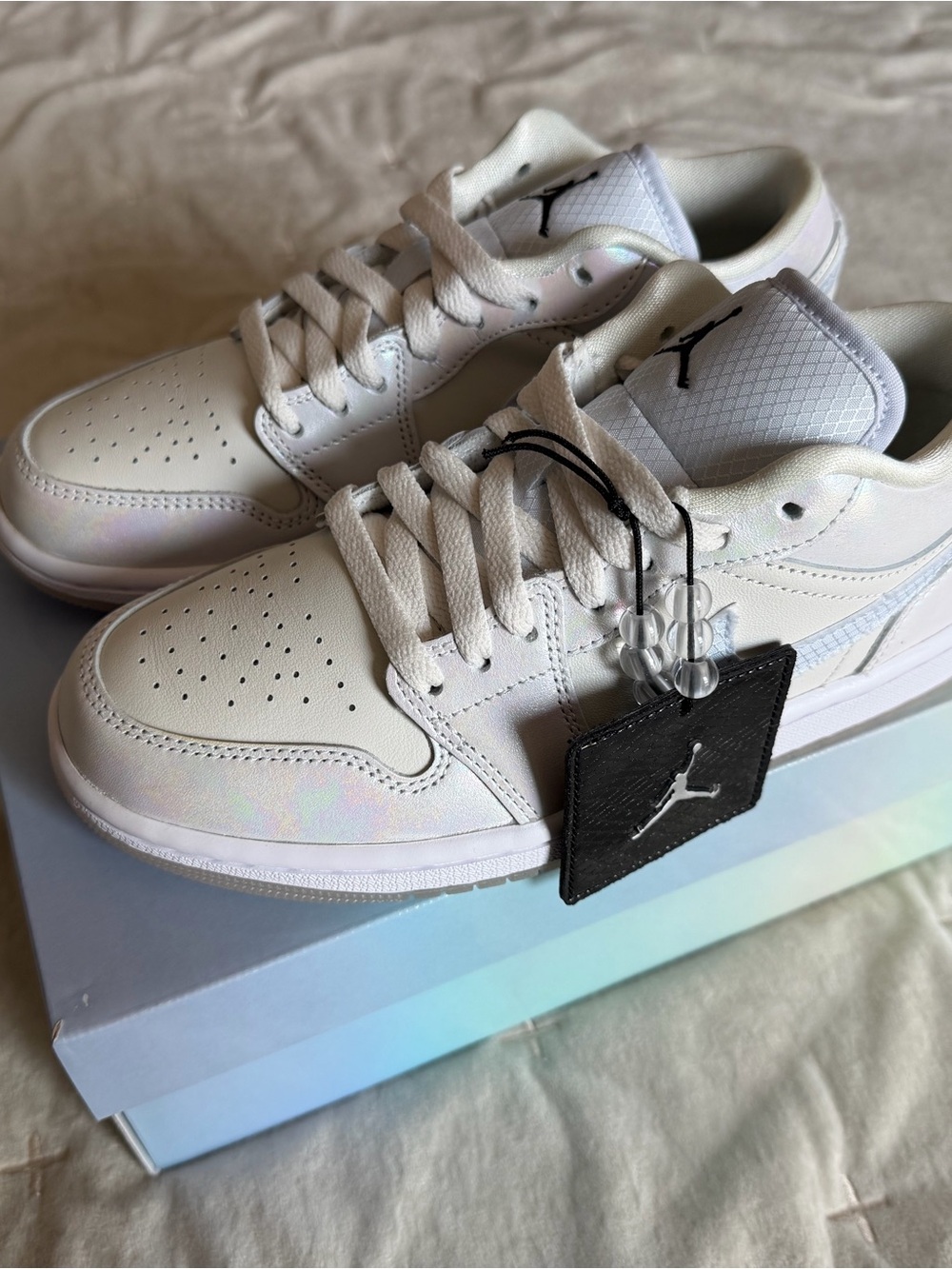 Jordan Low Top Sneakers in White with Iridescent Sheen. Year of the Snake